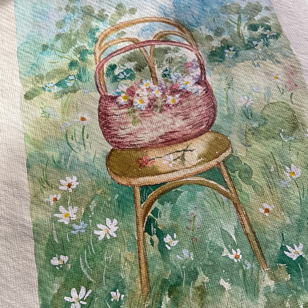 Woven basket of wildflowers on a vintage chair in meadow painting on cotton paper