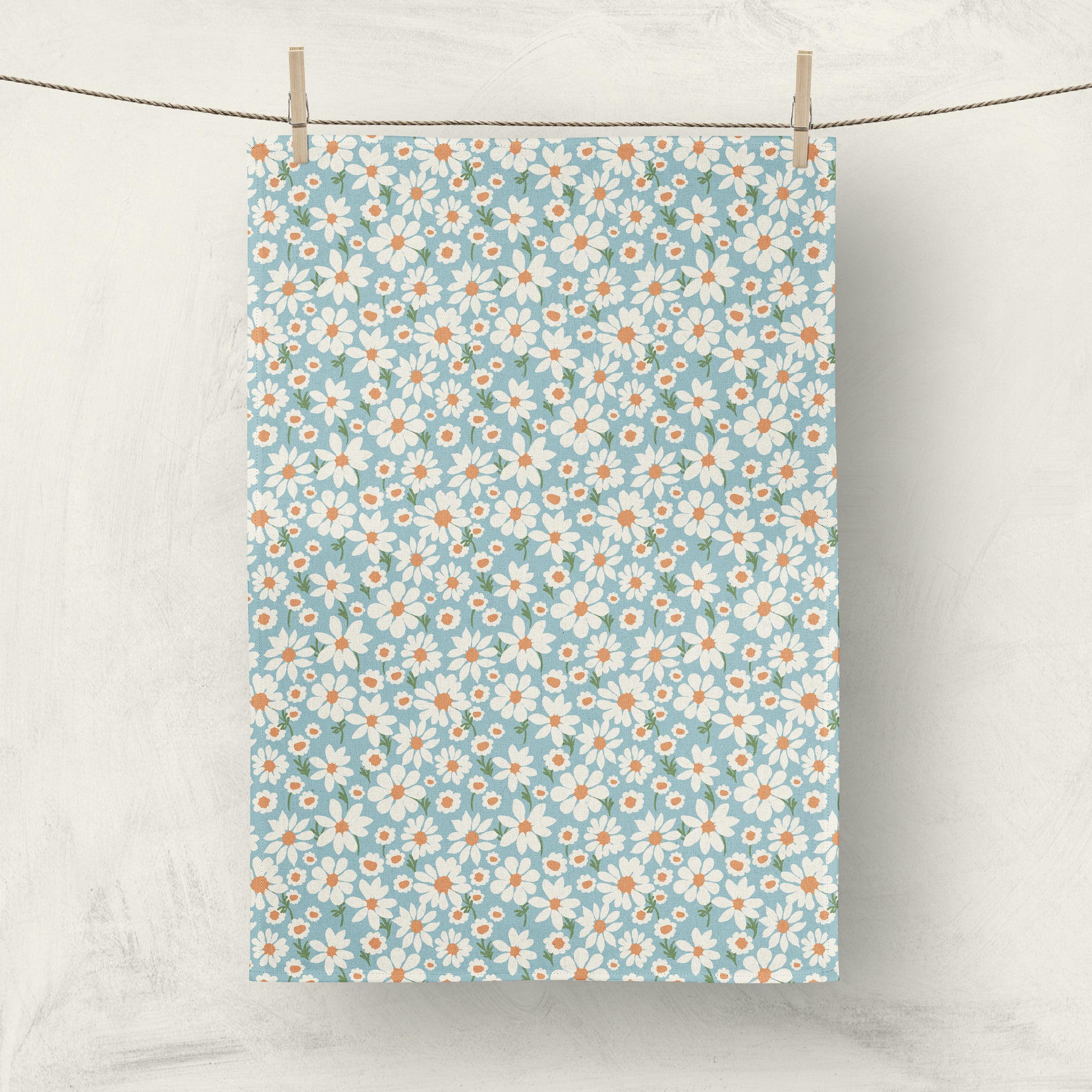 Blue daisy tea towel by Darya Karenski