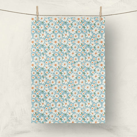 Blue daisy tea towel by Darya Karenski