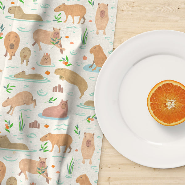 Luxury kitchen towel with happy capybaras - animal lover gift.