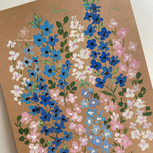 Botanical illustration in gouache on kraft paper for a calendar. Blue gouache flowers for July. Blue, pink, white, purple delphinium larkspur painterly floral composition