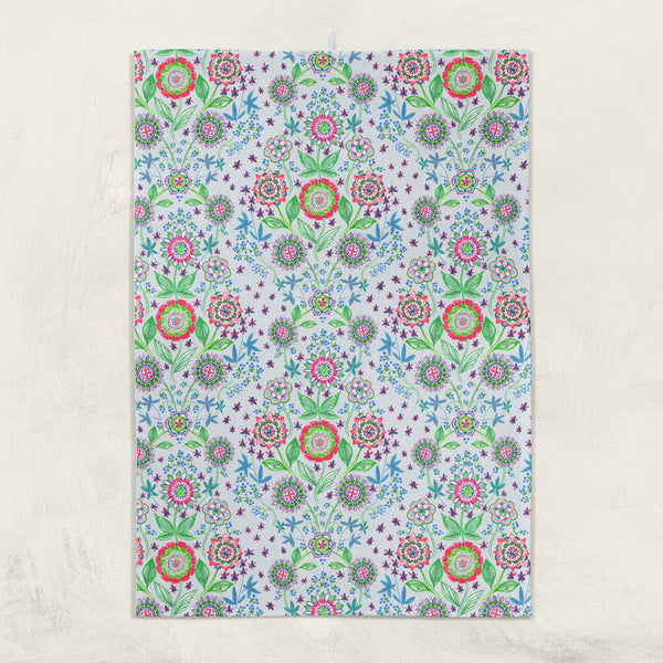 Elegant hostess gift tea towel with hand drawn print of a folk medallion floral