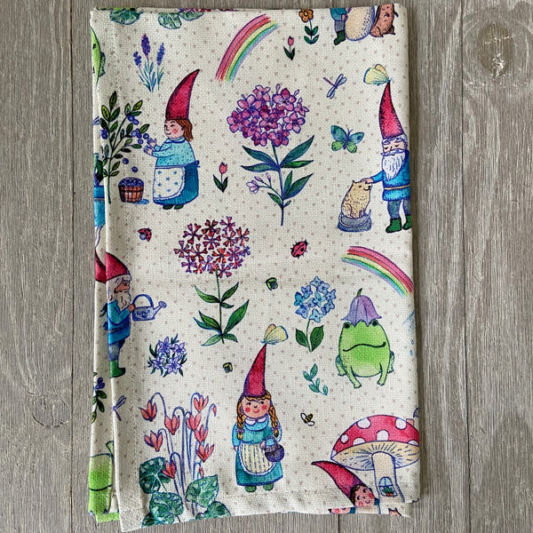 Luxury kitchen towel with garden gnomes, frogs and flowers by Pattern Talent